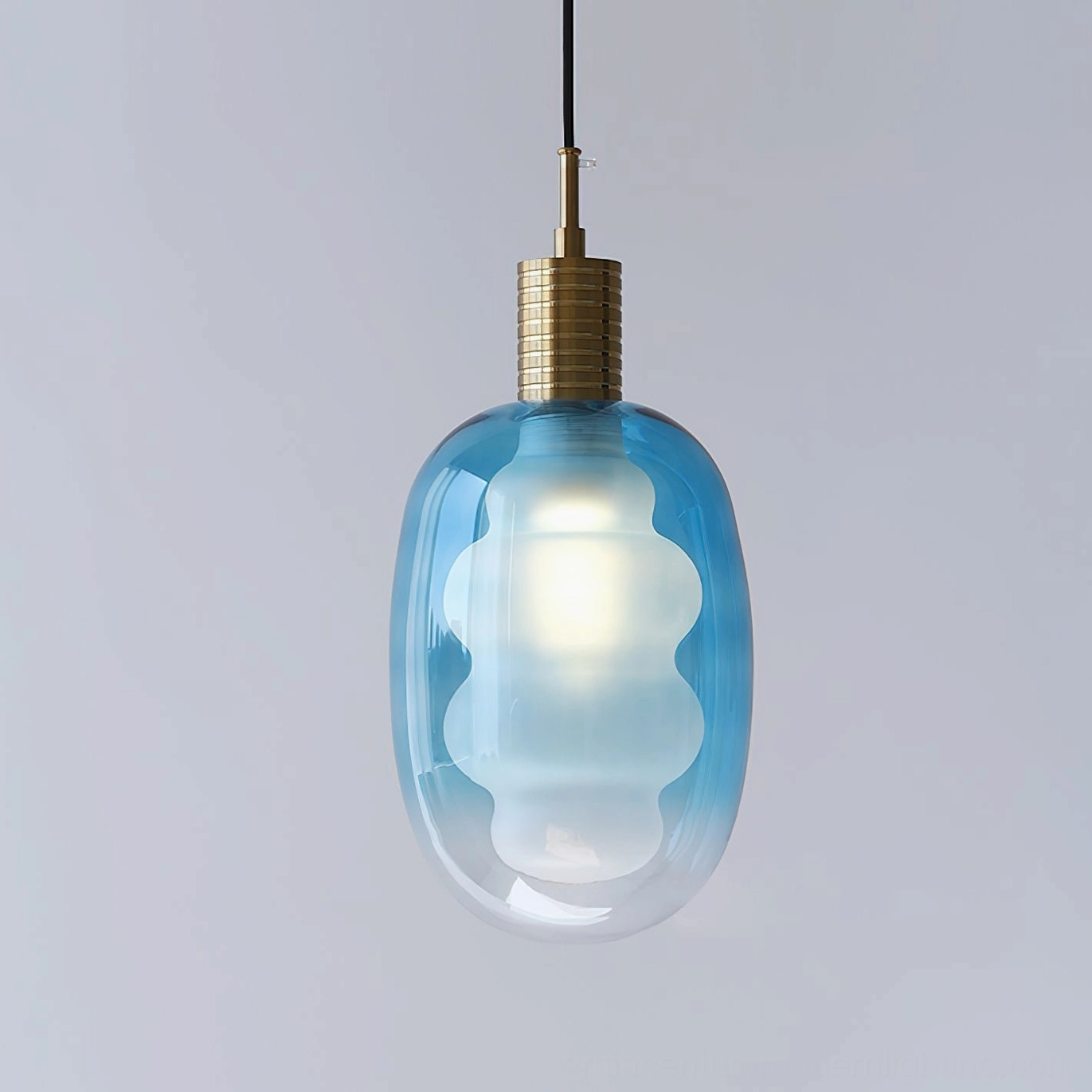 Gradient glass pendant fixture, artistic frosted shade, metal hardware detail, contemporary design