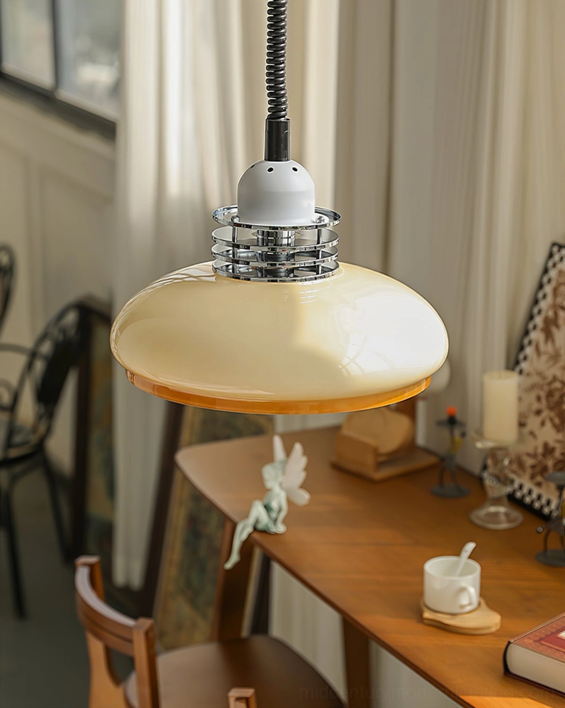 Beige and orange gradient vintage pendant lamp showcasing color depth and mid-century modern aesthetic in interior setting
