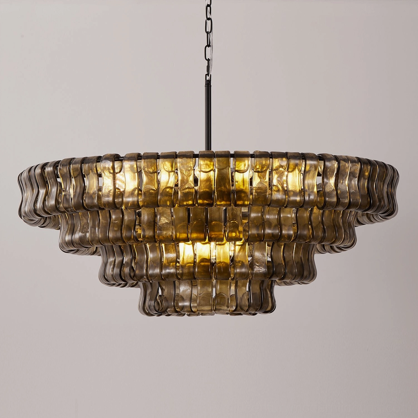 Grand 47.2 inch tiered round chandelier, clear glass tiles and black frame, showcasing ice-texture light refraction