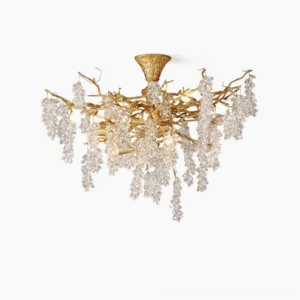 Grape bunch crystal chandelier with antique brass branches and clear glass grape pendants, studio frontal view on white background