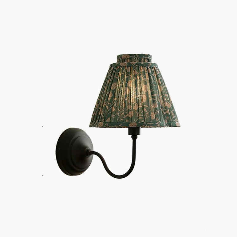 Green and black elbow wall sconce with pleated floral shade, full product view