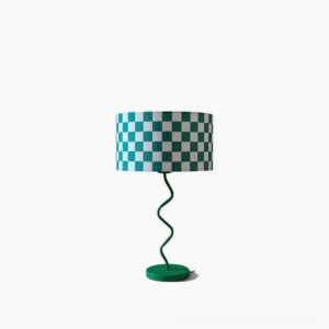 Green and white checkered fabric lampshade modern table lamp front view against white background