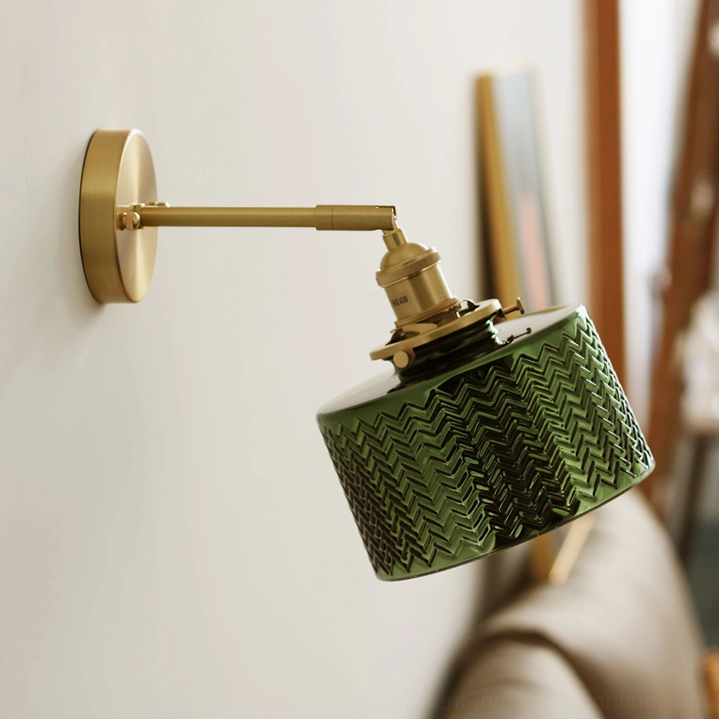 Green glass wall lamp mounted display showcasing warm ambient lighting effect in home
