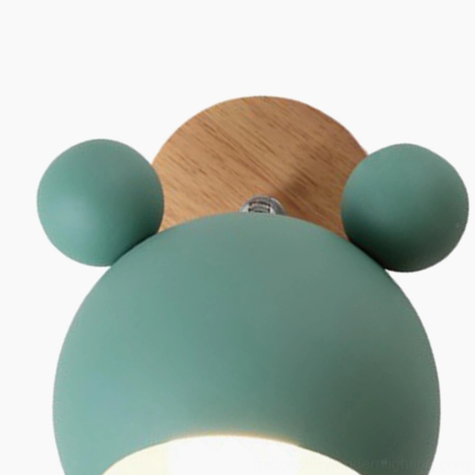 Green mouse wall sconce mounted in contemporary children's room playful design