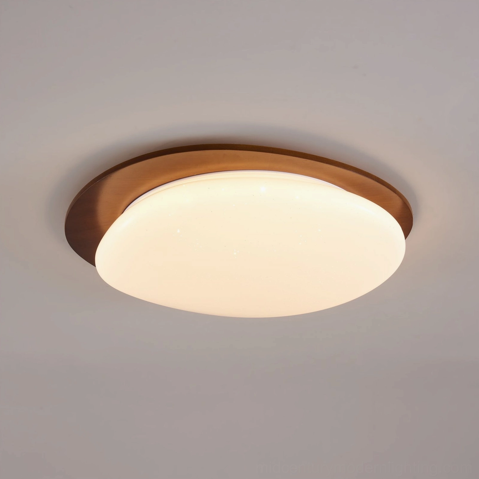 Gregg flush mount ceiling lamp featuring solid wood oval frame and opaline acrylic diffuser with glittery sparkle cast