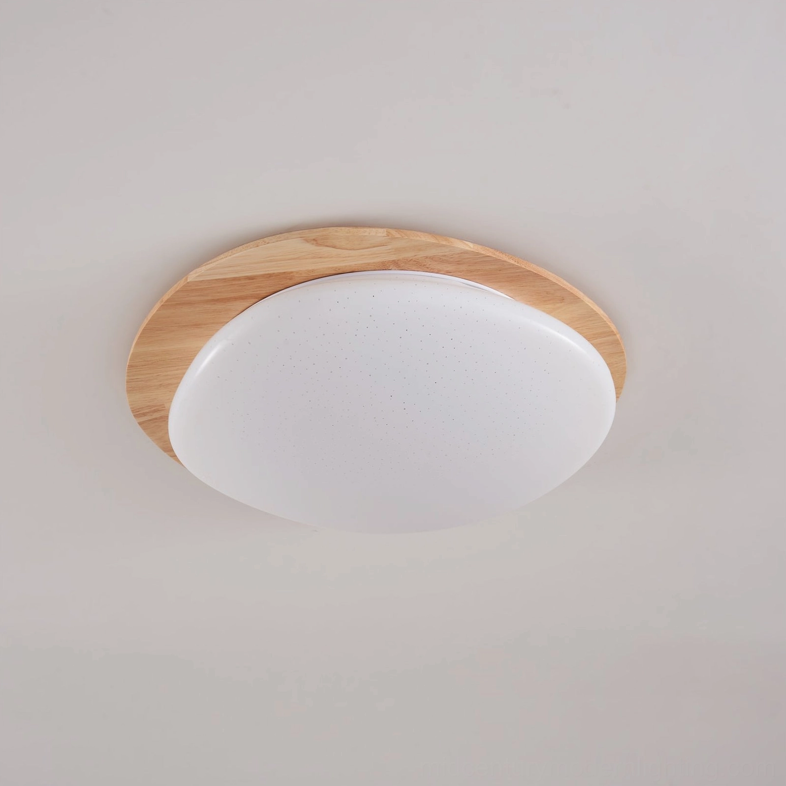 Gregg solid wood frame flush mount ceiling lamp, unlit matte white acrylic shade with subtle texture, close-up overhead