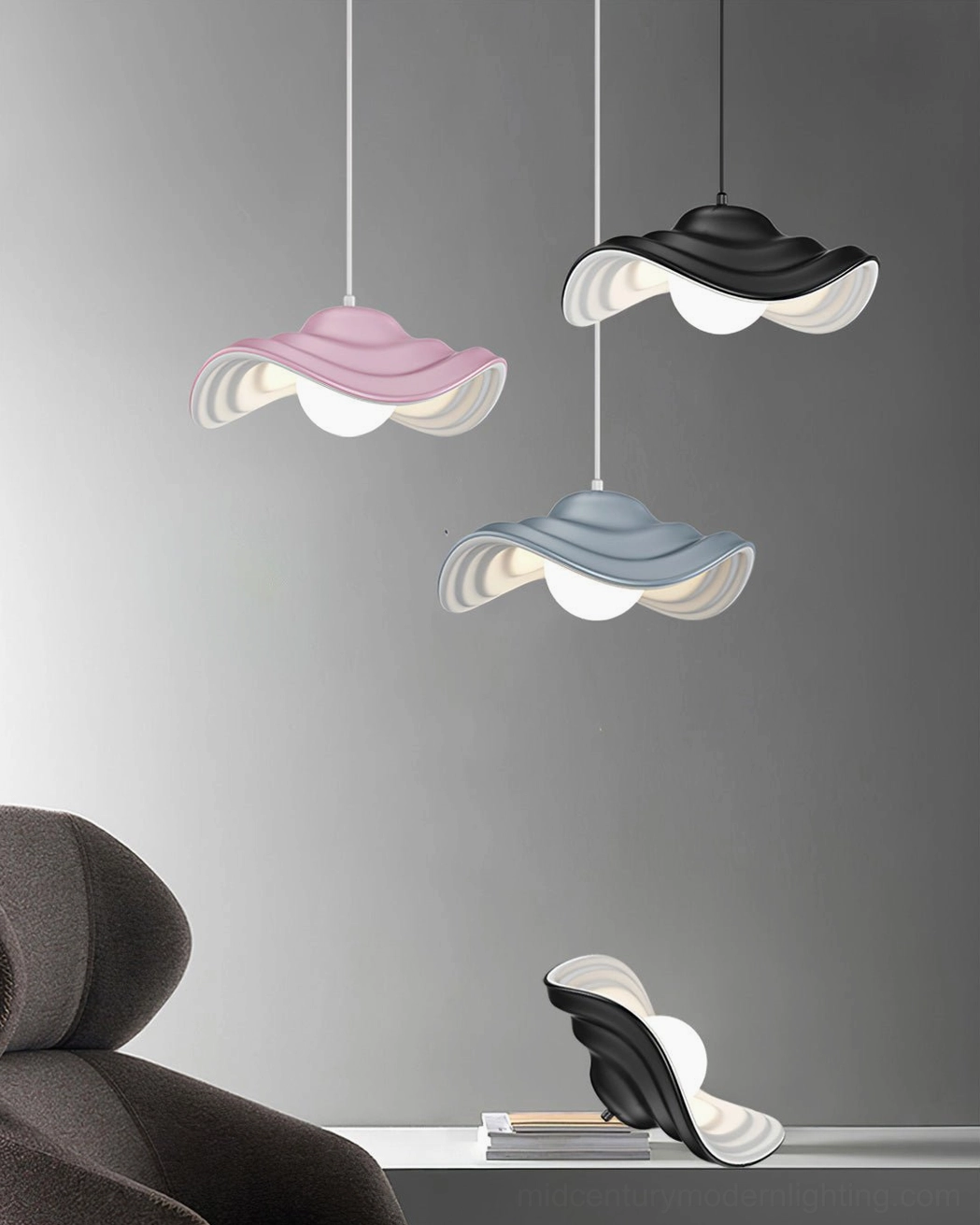 Soft grey wavy pendant light with minimalist Scandinavian-inspired design suspended in neutral contemporary home interior