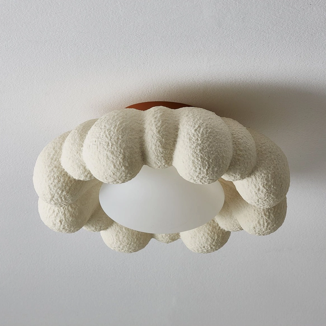 Unlit Gross cloud ceiling fixture with frosted resin diffuser, flat overhead view displaying textured surface details