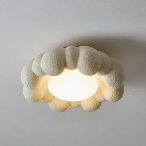 Modern cloud flush mount ceiling light with illuminated warm LED, flat top view showing terracotta metal base installation