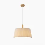 GT6 pleated pendant light with beige fabric shade and natural wood ceiling mount, studio front view on white background