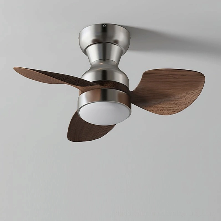 Haiku ceiling fan light side close-up detail view, brushed silver metal housing, recessed LED lamp cover, minimal profile design on white background