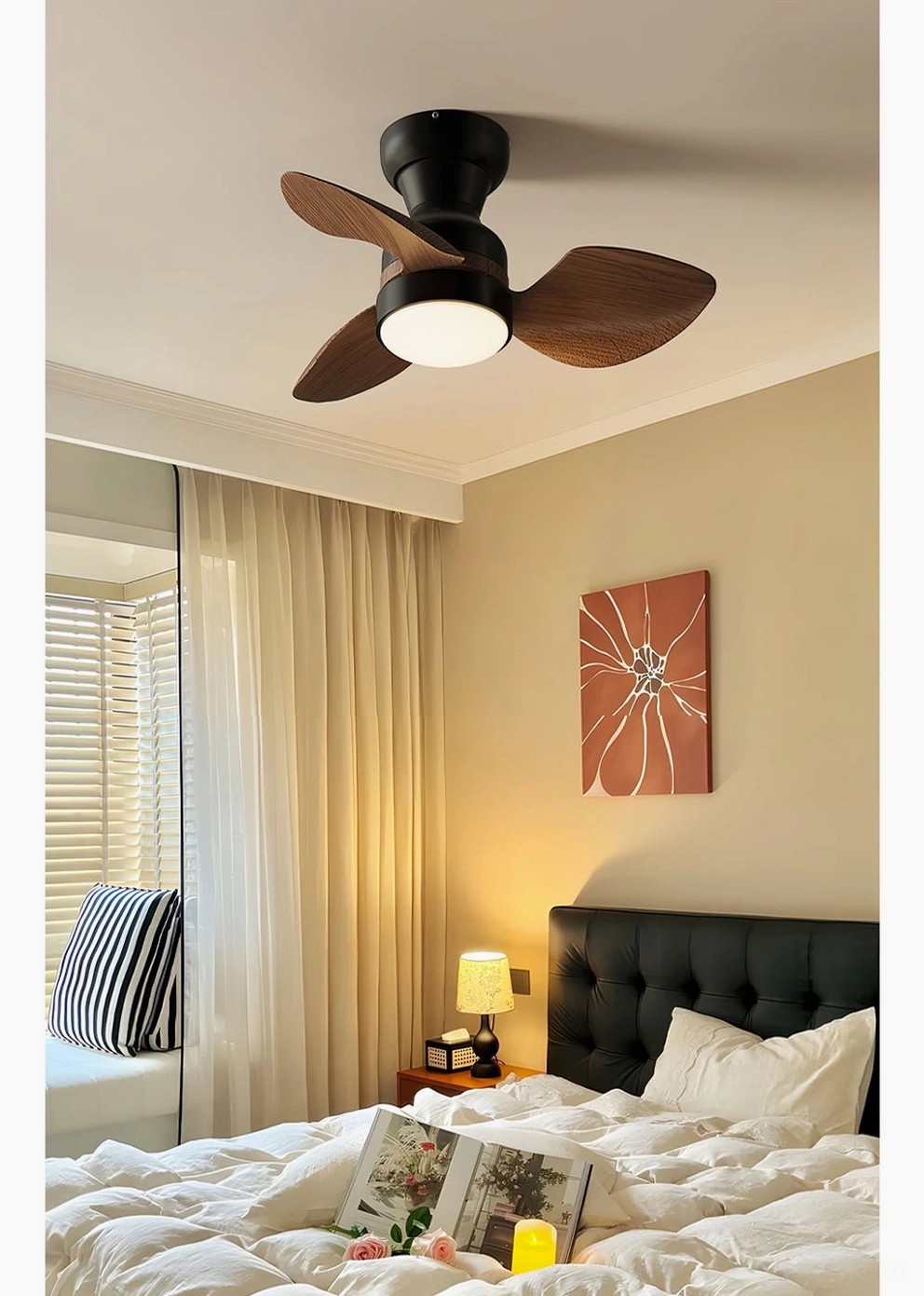 Haiku ceiling fan light in residential bedroom interior, matte black finish with walnut wood grain blades, integrated LED light source