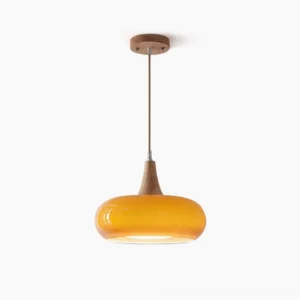 Hailie mid-century modern pendant lamp with warm amber glass shade and walnut wood frame, studio front view