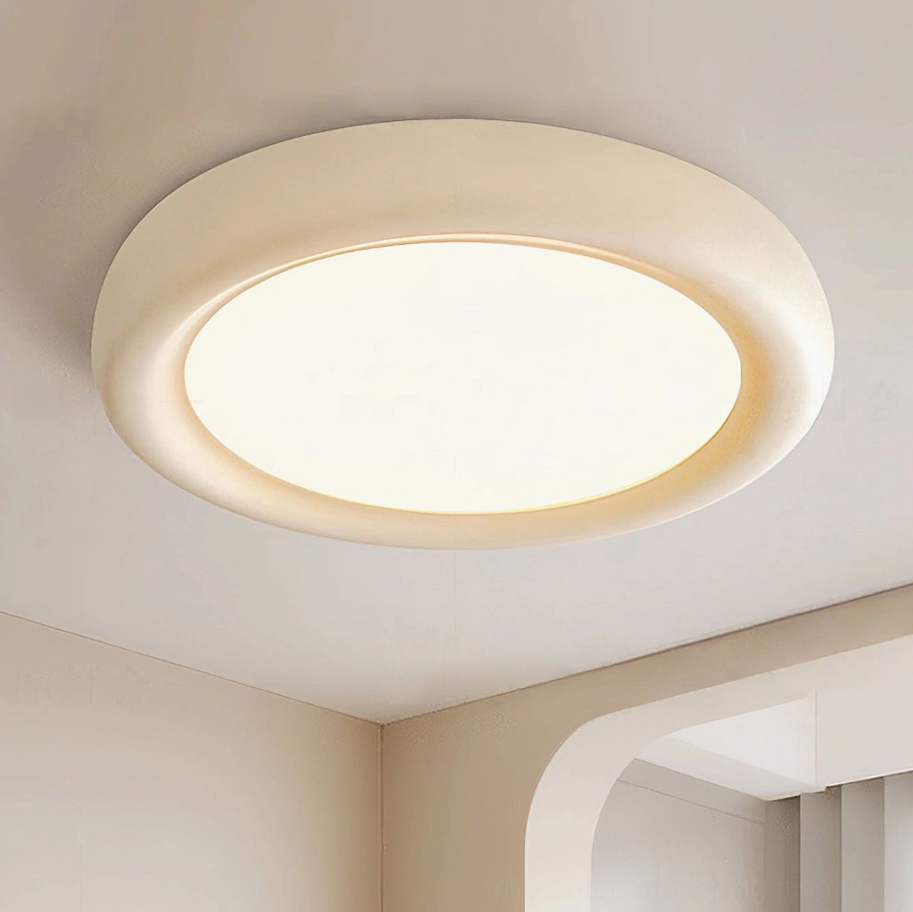 Haines cream white beige flush mount ceiling light, overhead indoor view in empty minimalist room with soft neutral design