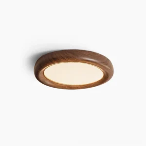 Haines mid-century modern round flush mount ceiling lamp in walnut finish, front overhead studio view with minimalist white background