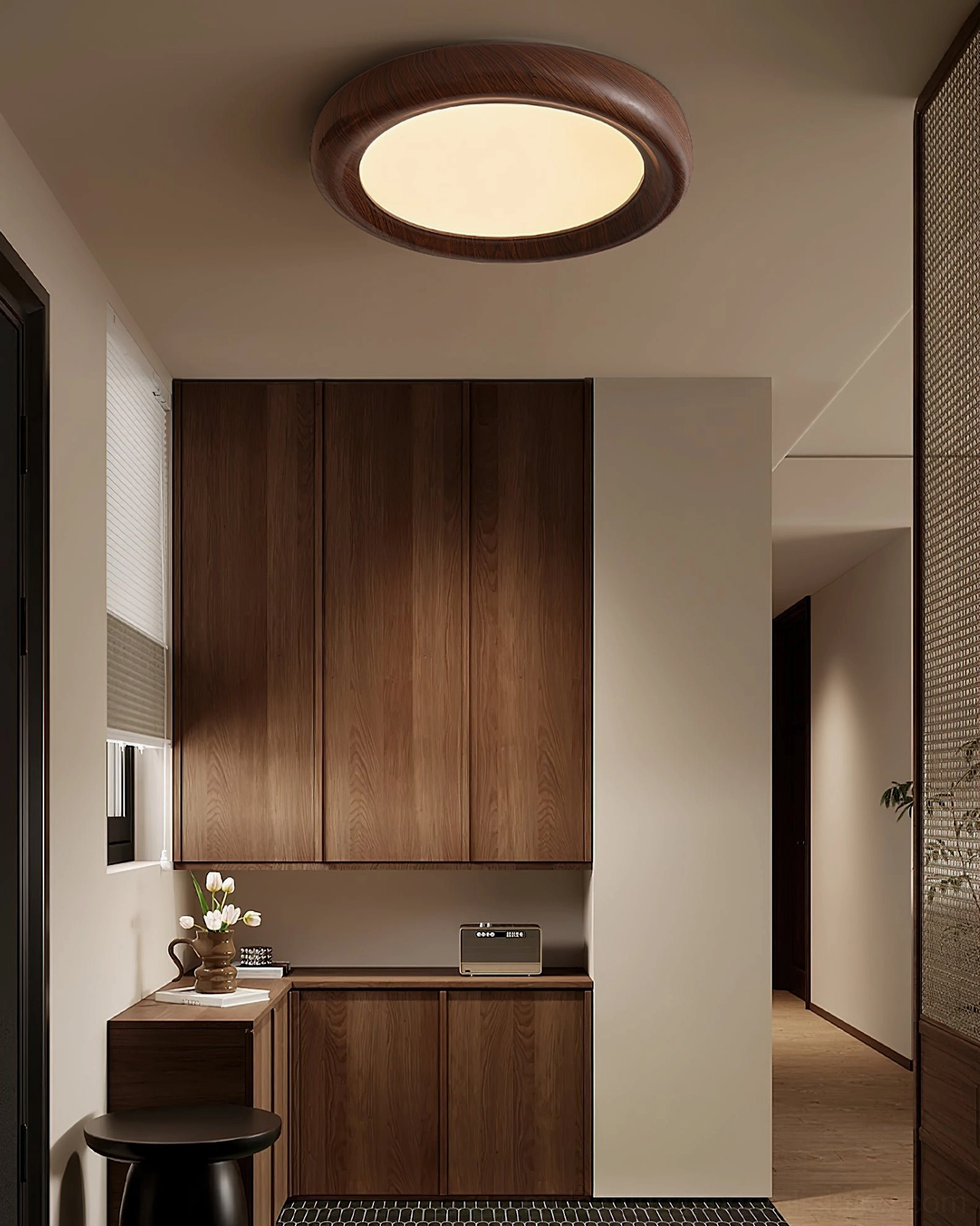 Haines flush mount ceiling lamp installed in mid-century modern kitchen with dark wood cabinetry and natural decor