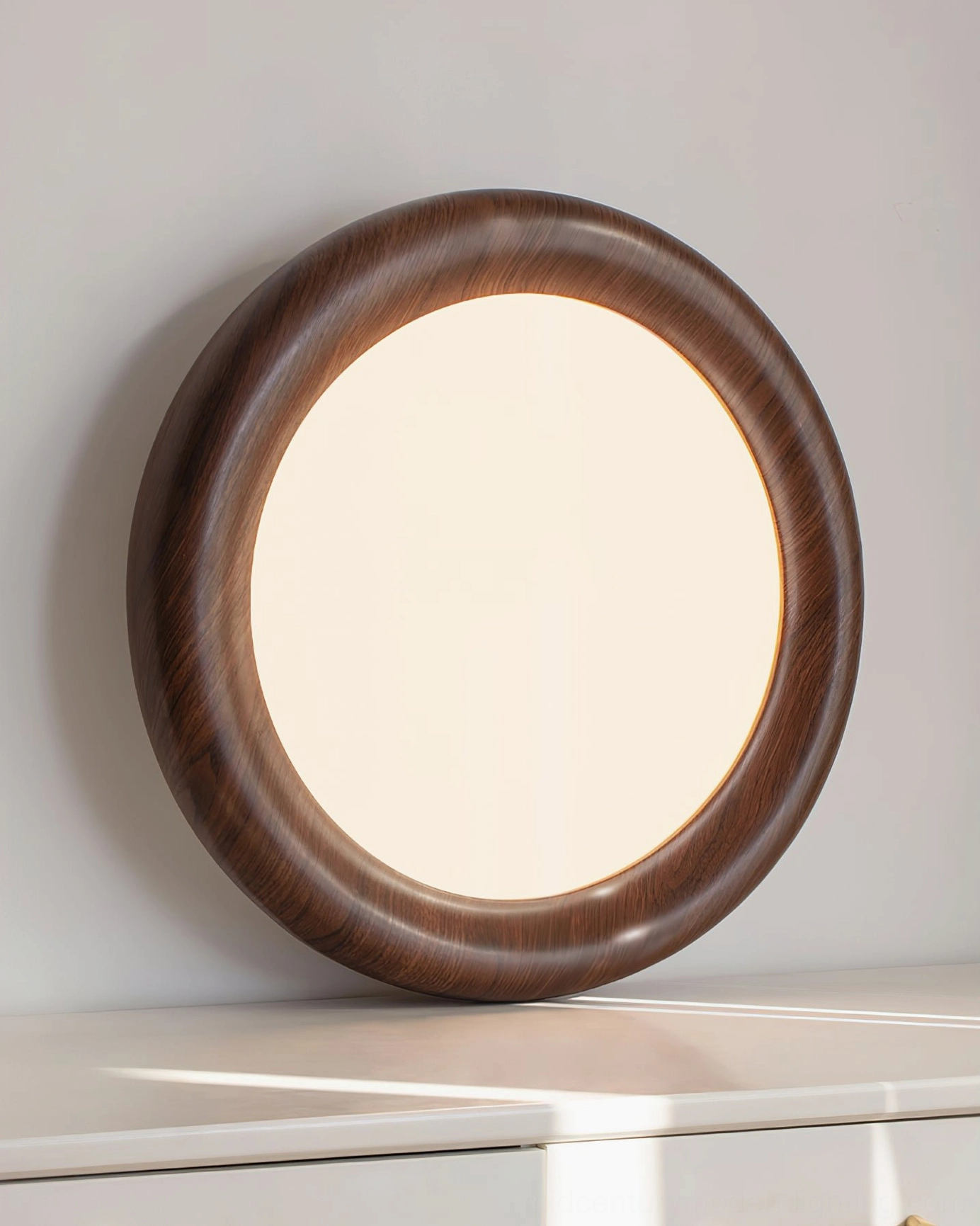 Haines round modern ceiling lamp with sleek rim design, close-up front view on white dresser, minimalist styling