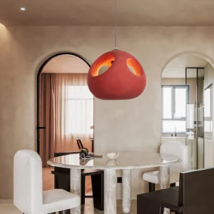 Halia pendant lamp installed in modern dining room with arched doorways and minimalist interior decor