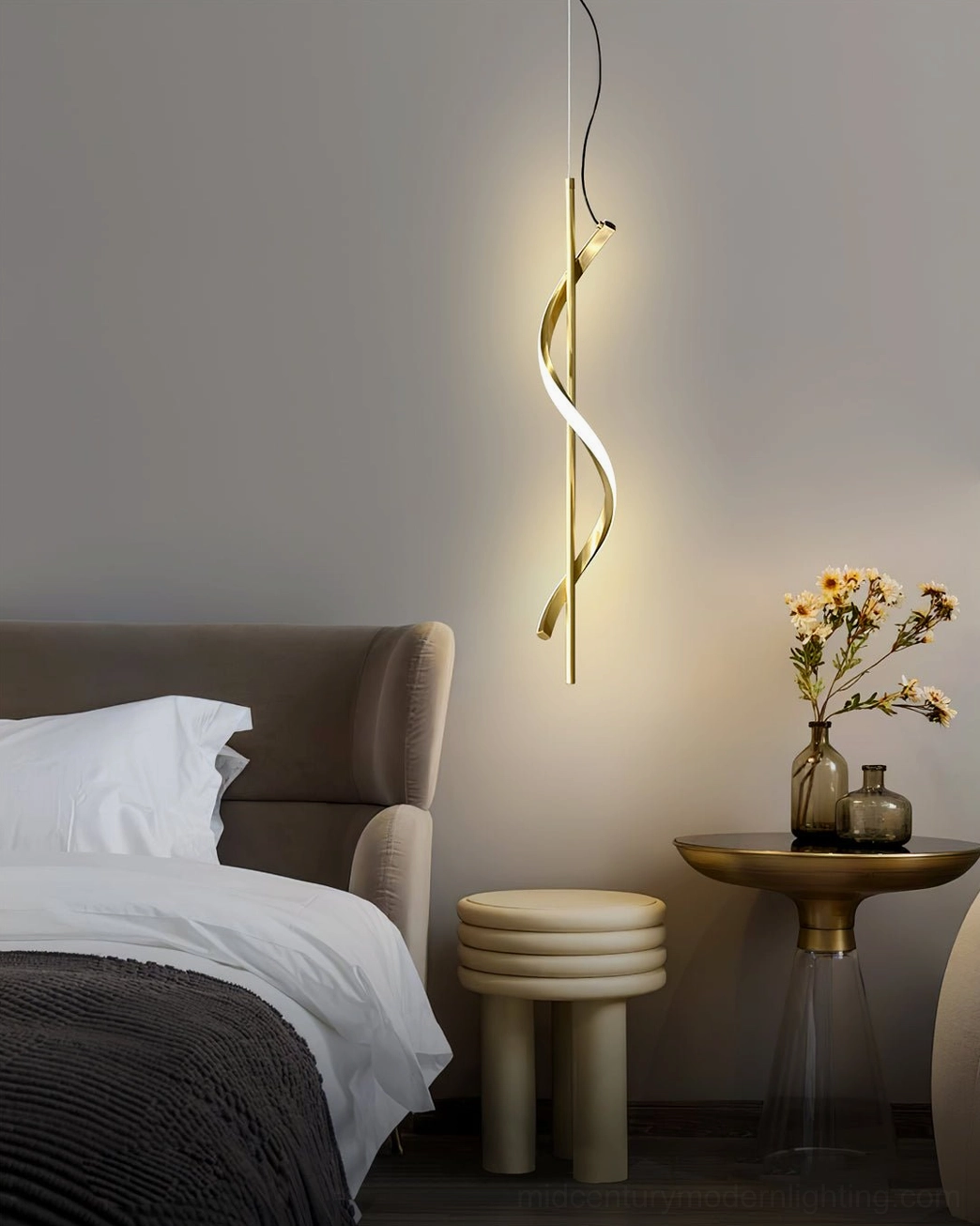 Gold Hamburg spiral pendant in luxury modern bedroom corner with floral side table decor and warm glow