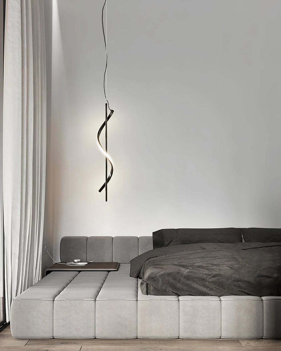 Hamburg pendant lamp installed as bathroom vanity light with clear studio lighting showing brass and acrylic construction