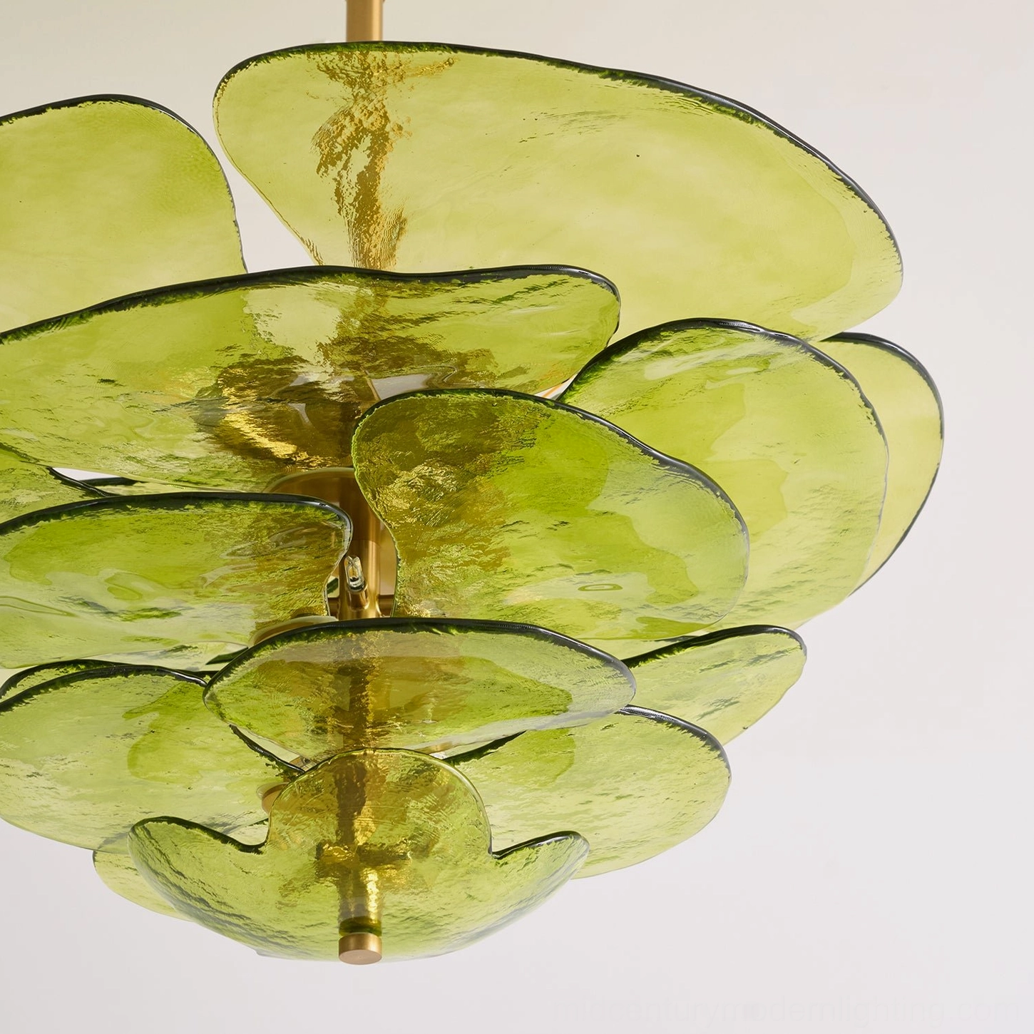 Hand-blown lotus petal glass light showing warm interior glow and textured glass surface
