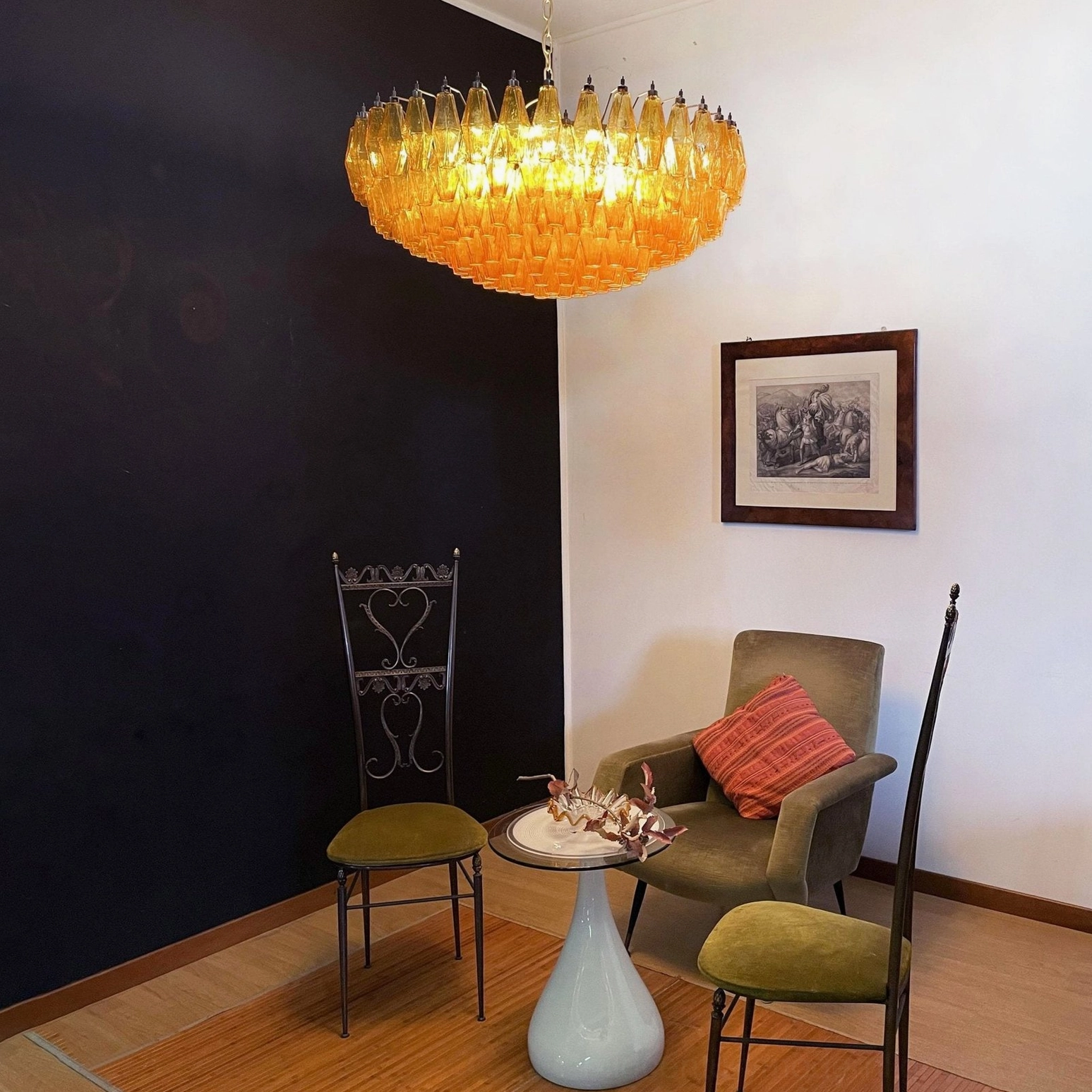 Warm amber hand-blown glass chandelier showing individual Murano glass craftsmanship and variations