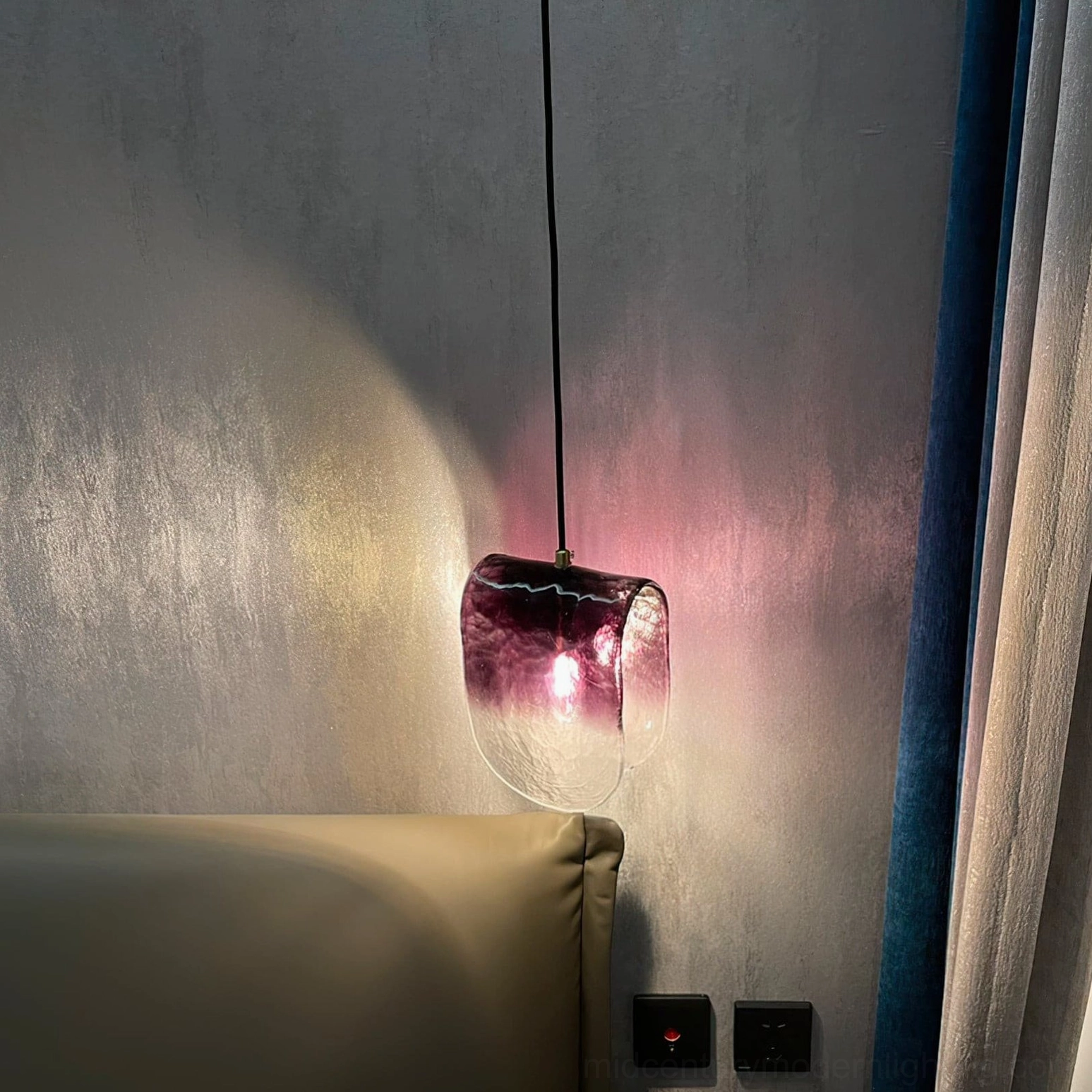 Hand-blown pendant light fixture demonstrating texture detail and color gradient craftsmanship