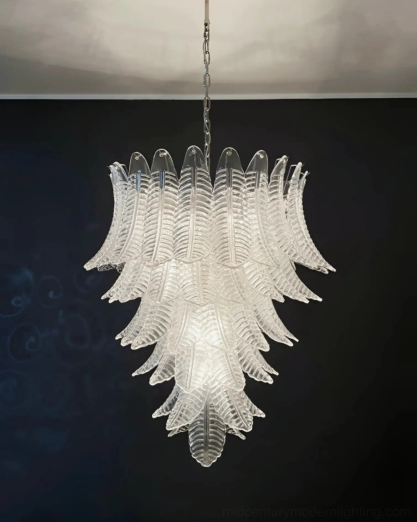 Venetian hand-blown glass chandelier showing craftsmanship and translucent pink coloring