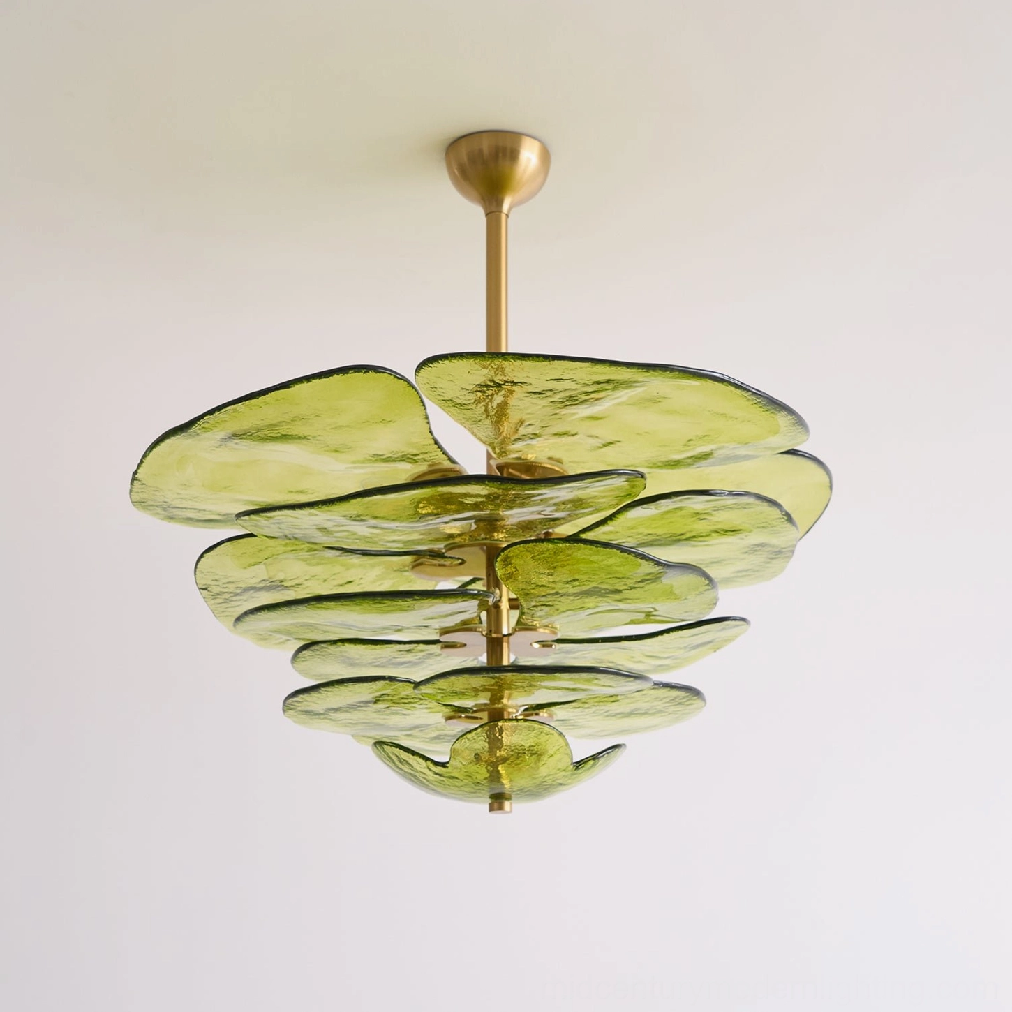 Hand-crafted lotus petal light fixture showing translucent glass construction and sculptural form