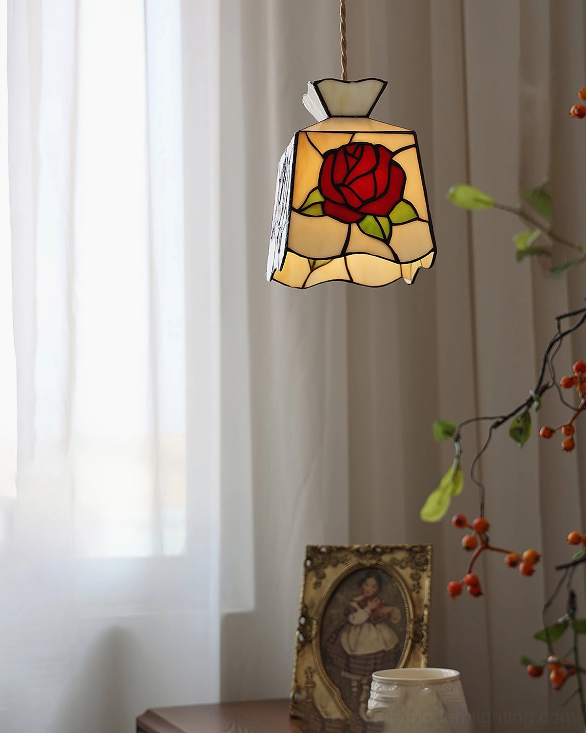 Handcrafted rose stained glass Tiffany pendant light with brass fixture, detailed close-up of the delicate floral glass work