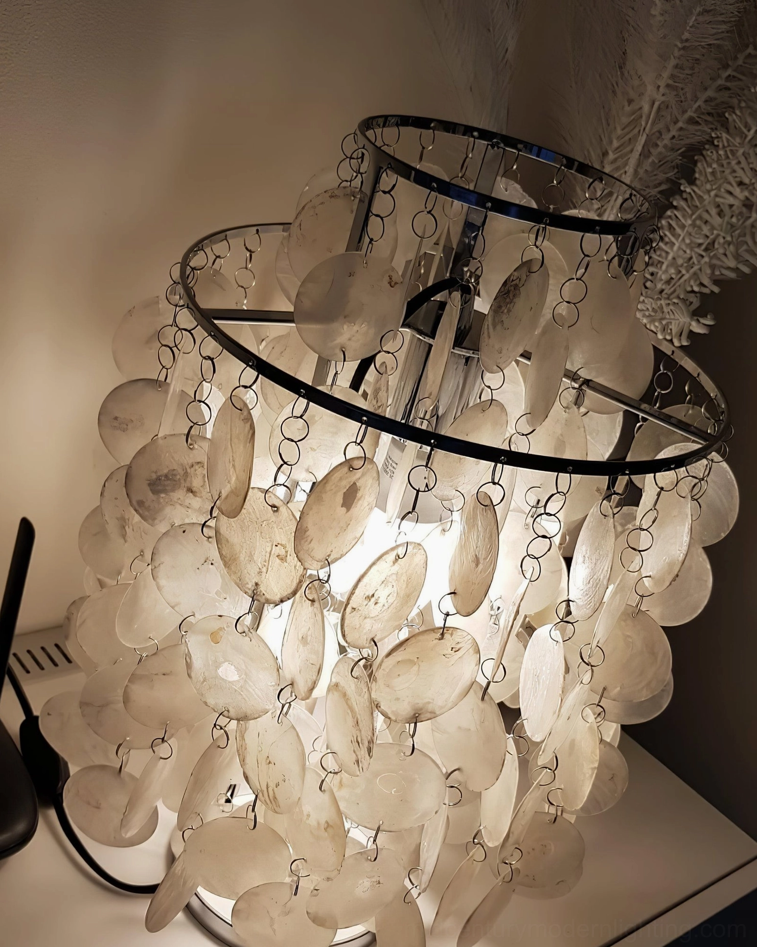Handcrafted mother-of-pearl shell table lamp showing quality construction detail