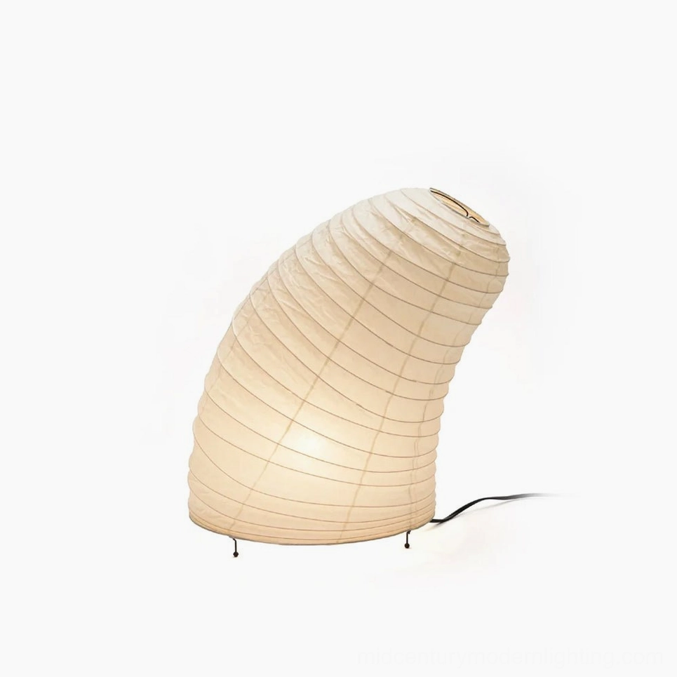 Sculptural washi paper table lamp with organic biomorphic design, front three-quarter view showcasing ribbed mulberry paper texture and circular apertures