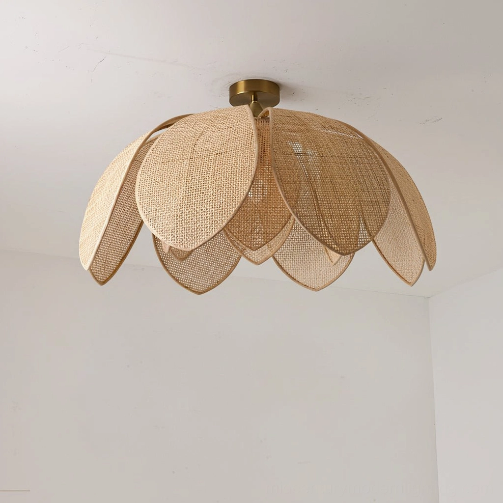 Hanove lotus rattan ceiling light side view, detailed woven petal structure with brass metal fixture in studio lighting