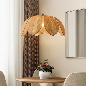 Hanove bohemian pendant light hanging above dining table in warm minimalist interior with natural light and curtains