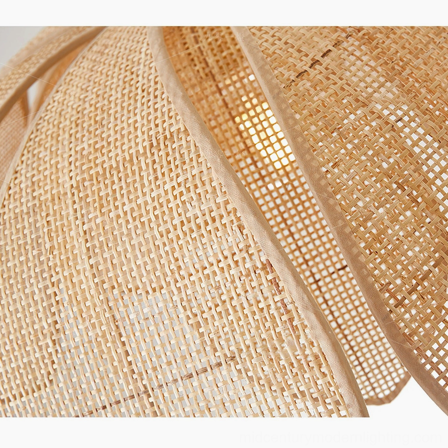 Close-up macro view of Hanove rattan ceiling light woven petal material, natural fiber texture with brass fixture interior