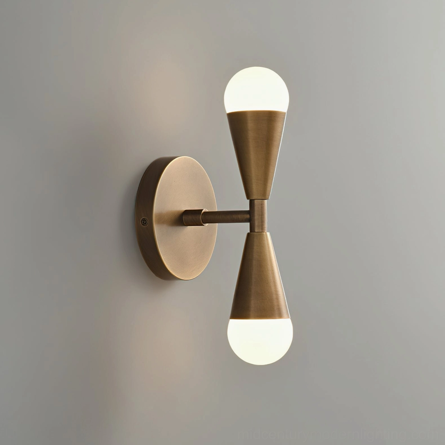 Dual-head vertical Harlan Gooseneck Wall Sconce, symmetric tapered brass shades with frosted bulbs, studio frontal close-up
