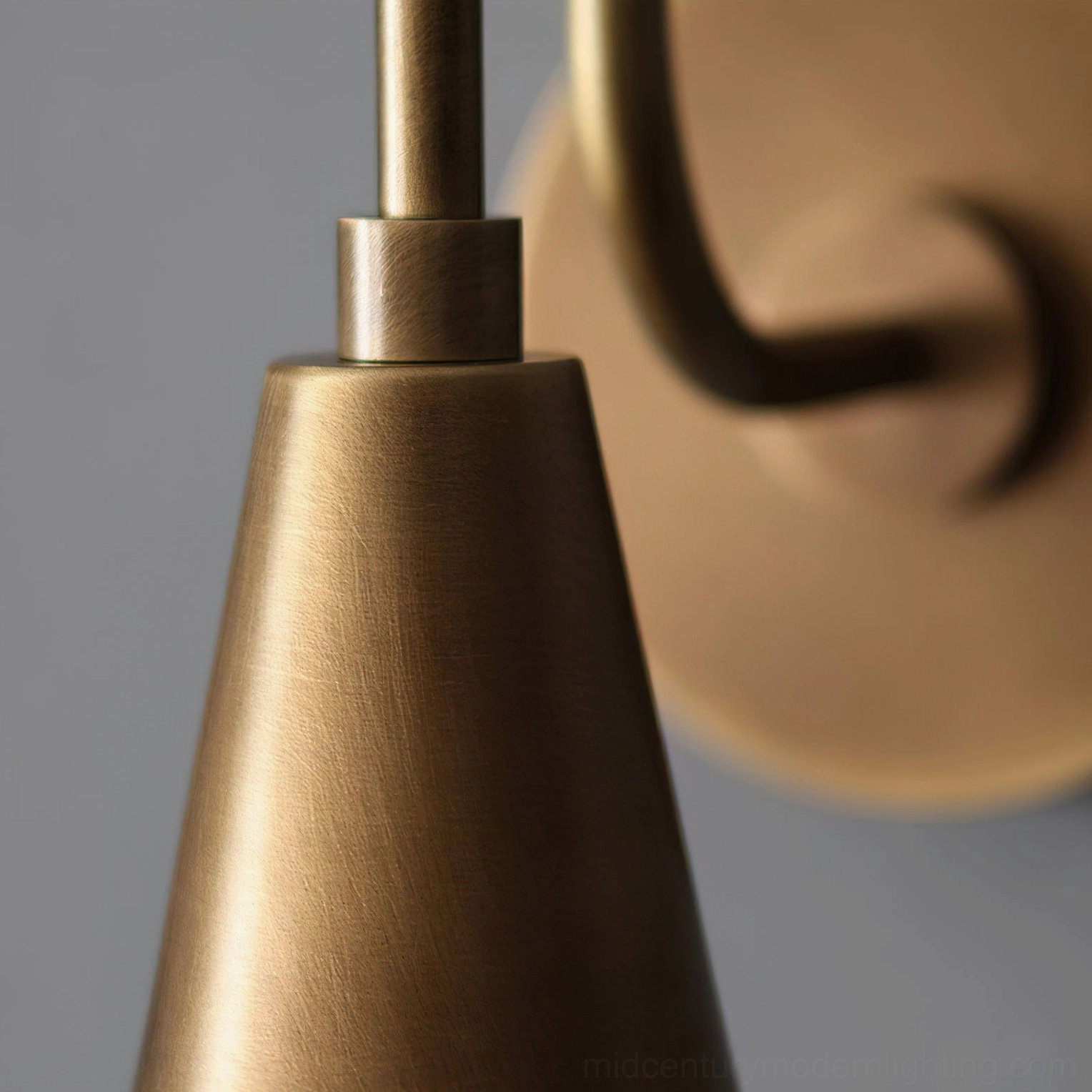 Harlan Gooseneck Wall Sconce detail shot, hand-applied antique brass patina, artisanal finish close-up