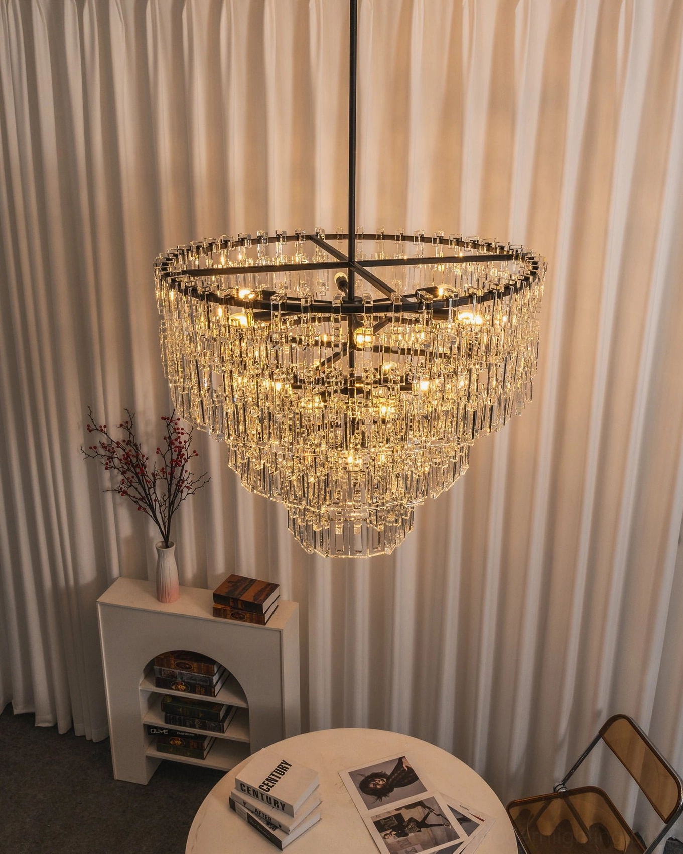 Matte black geometric crystal chandelier bottom view showing crystal arrangement and frame geometry