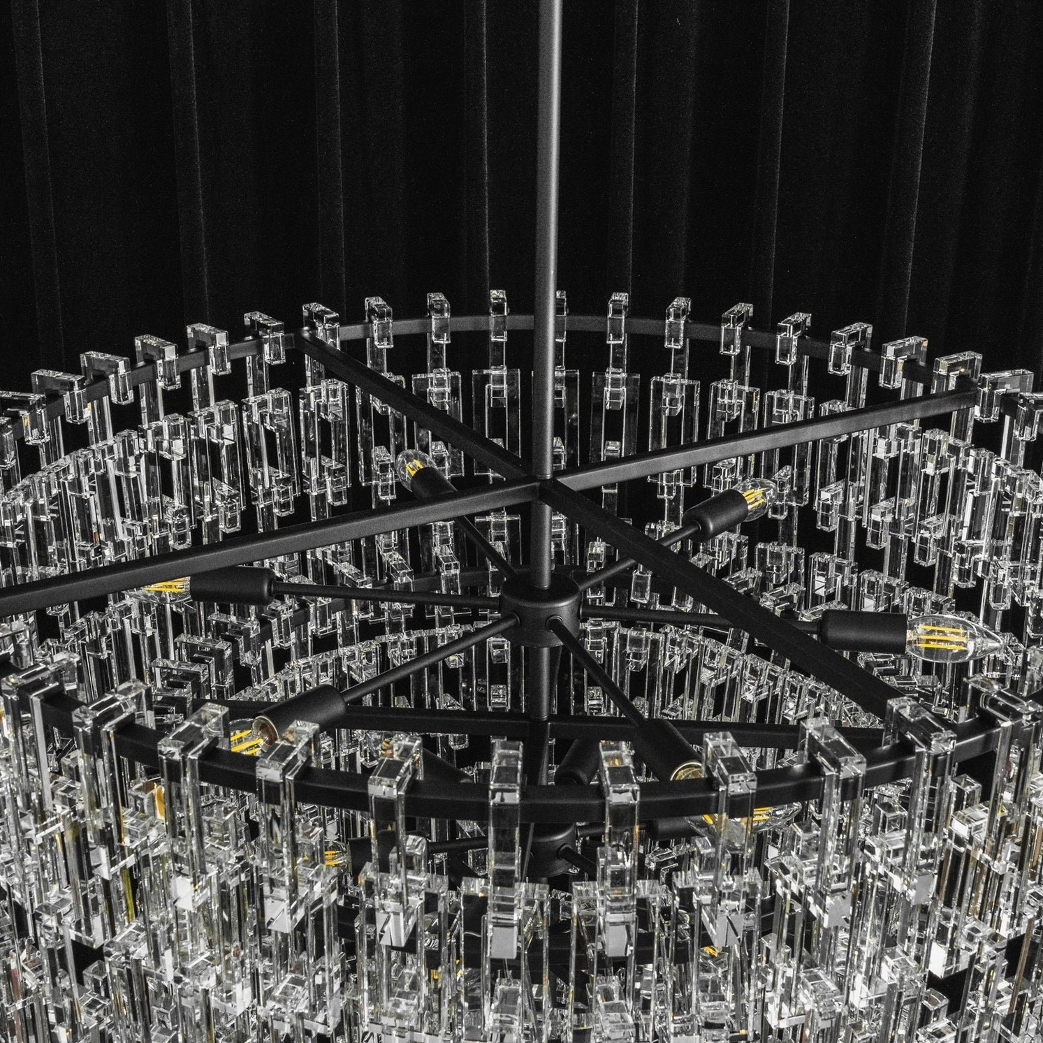 Crystal pendant light fixture showing geometric prism cutting and light distribution detail shot
