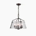 Harrow industrial five-head pendant chandelier with dark bronze frame and rippled glass shades, front studio view