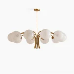 Havana 10-light brass globe chandelier with frosted white glass shades and polished gold metal frame, front-facing studio view