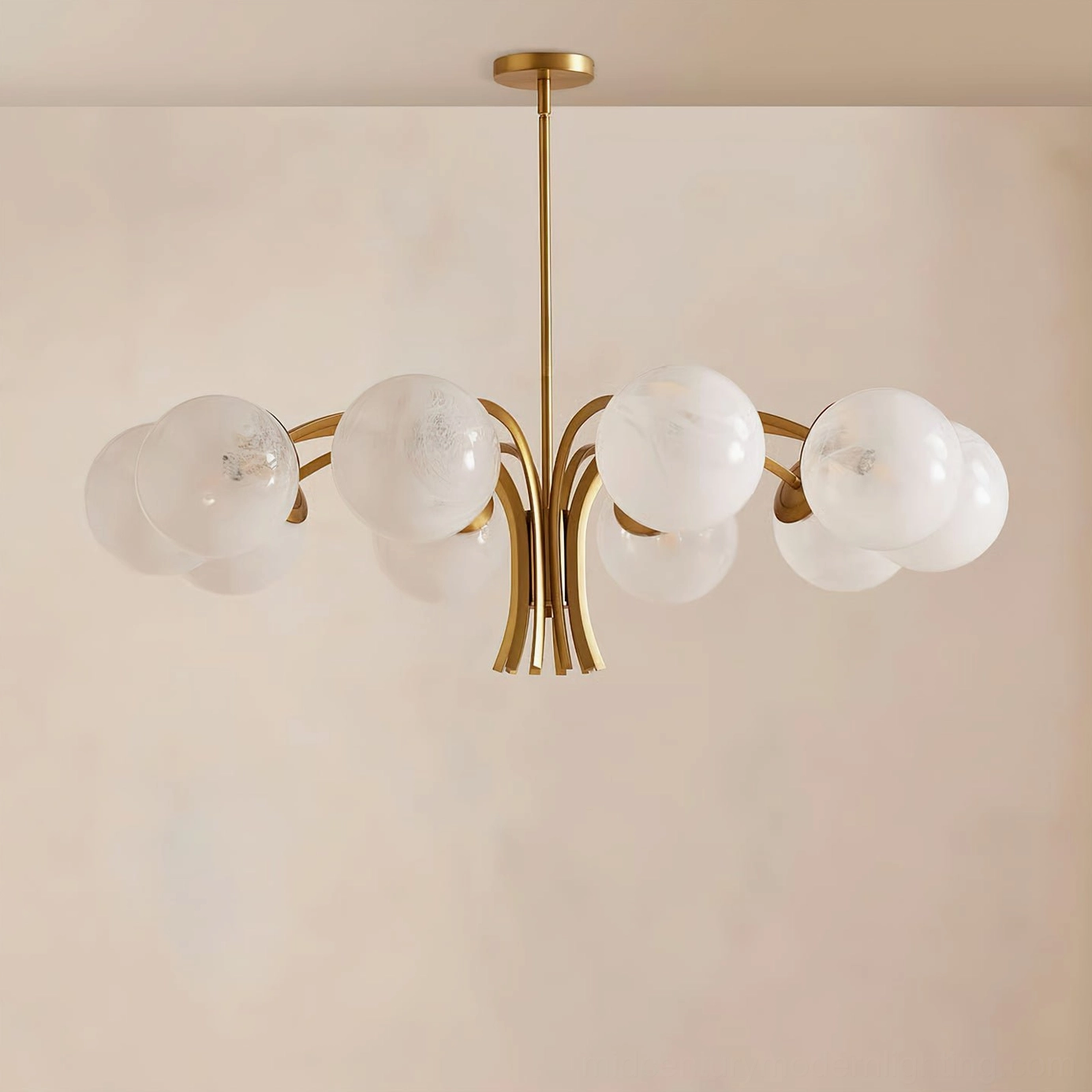 Mid-century modern brass globe chandelier with spherical frosted glass orbs and polished metal arms, angled product view