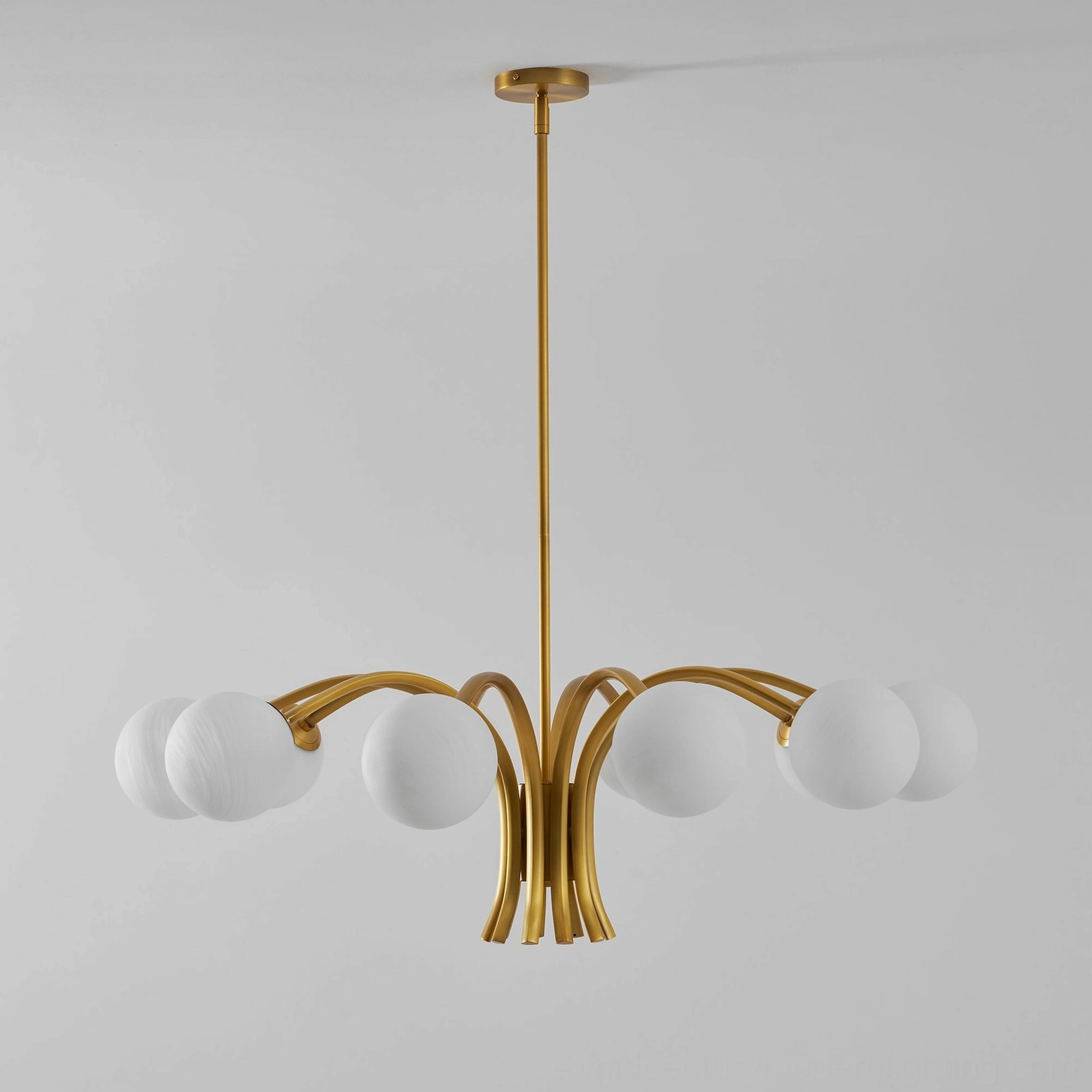 Stylish Havana brass chandelier with luminous frosted glass globes for ambient home lighting