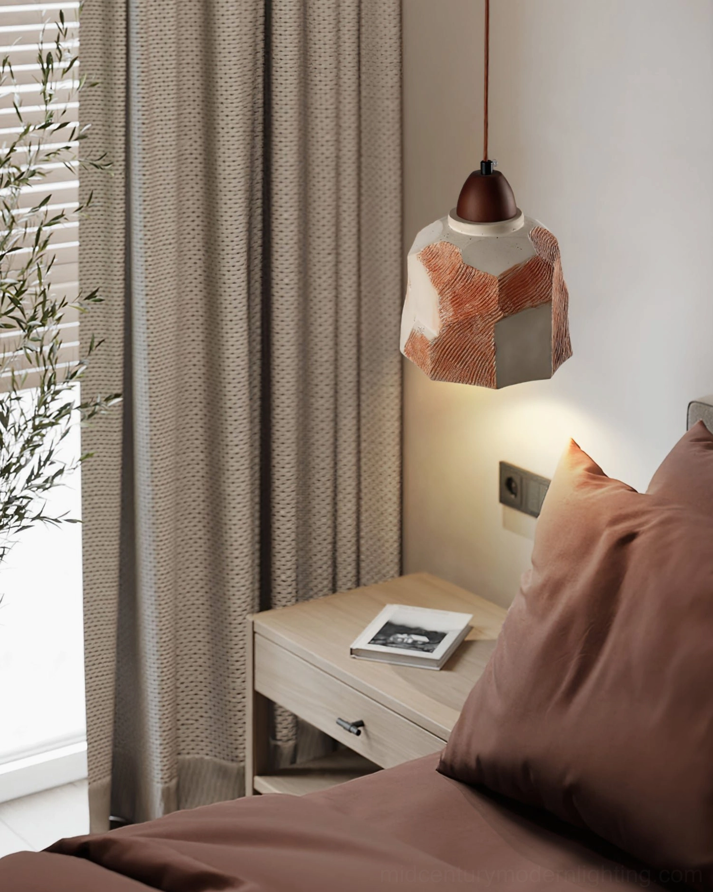 Havre ceramic pendant light installed in neutral bedroom wall setting with warm home decor style
