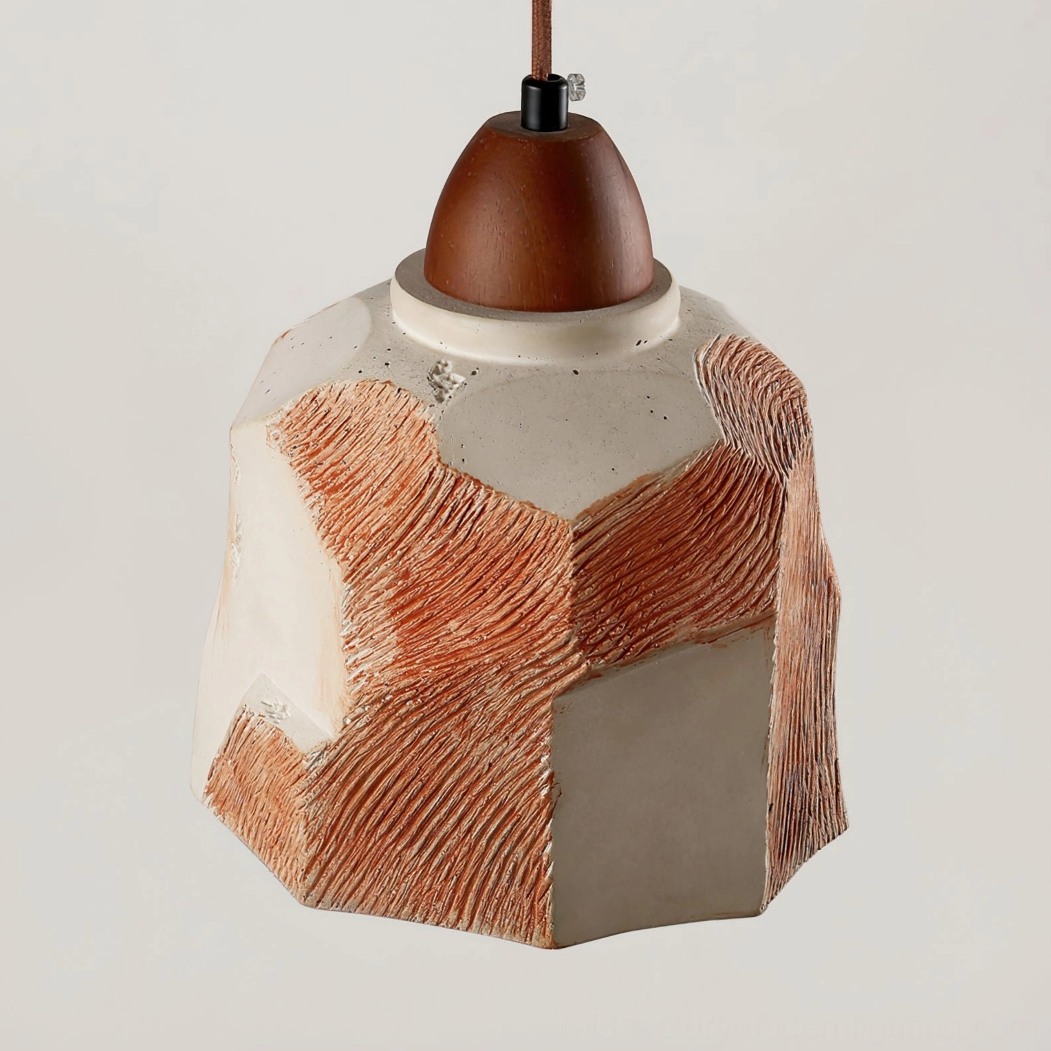 Side perspective view of Havre mid-century modern pendant fixture showing irregular shape design