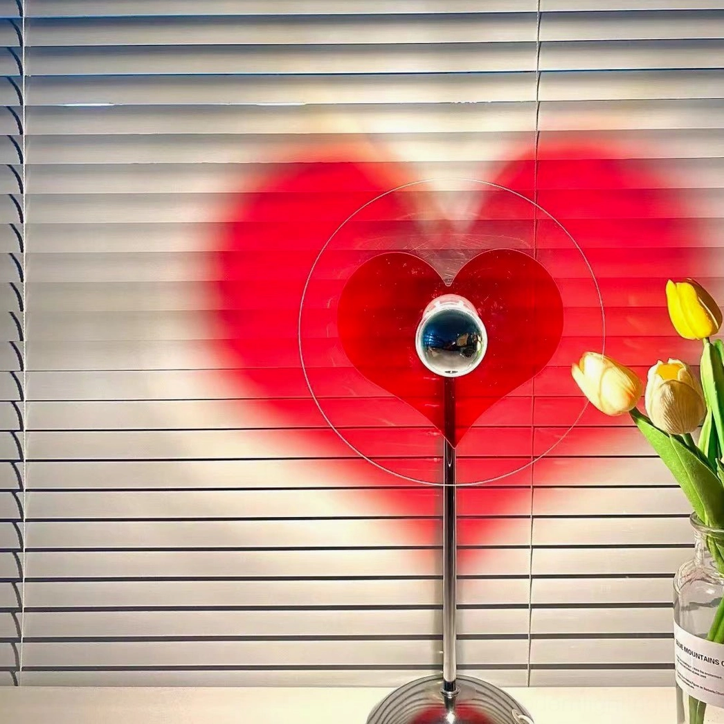 Heart projection lamp demonstrating precise acrylic engineering for optimal light diffusion effect