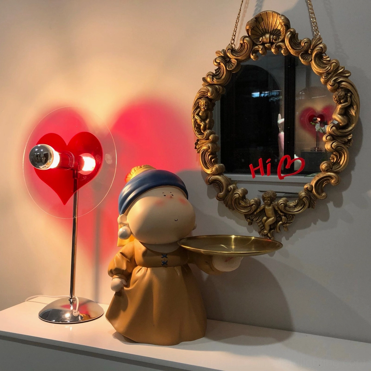 Heart projection lamp in eclectic and bohemian interior design aesthetic with layered textures