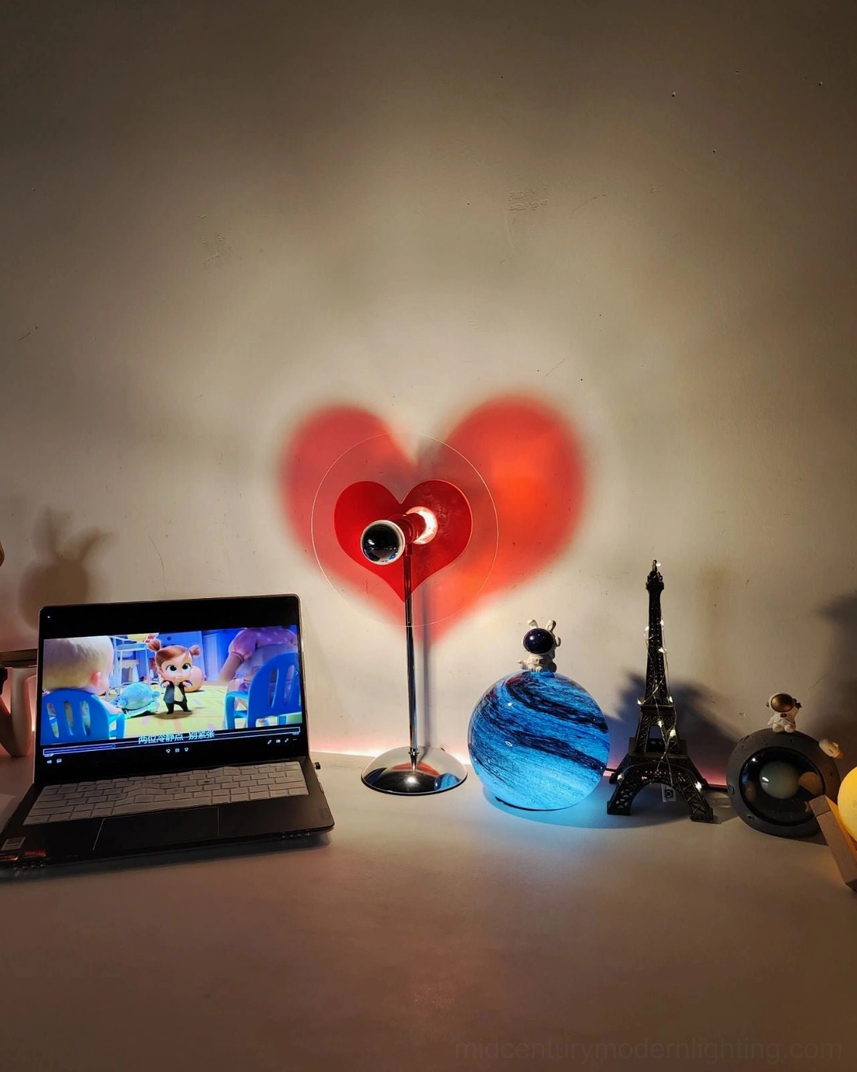 Heart projection lamp as reminder of importance of emotional connection in contemporary daily living