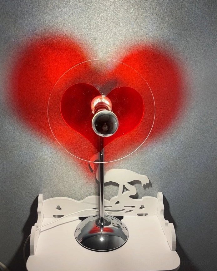 Heart projection lamp delivering functional lighting and artistic expression for modern home environments