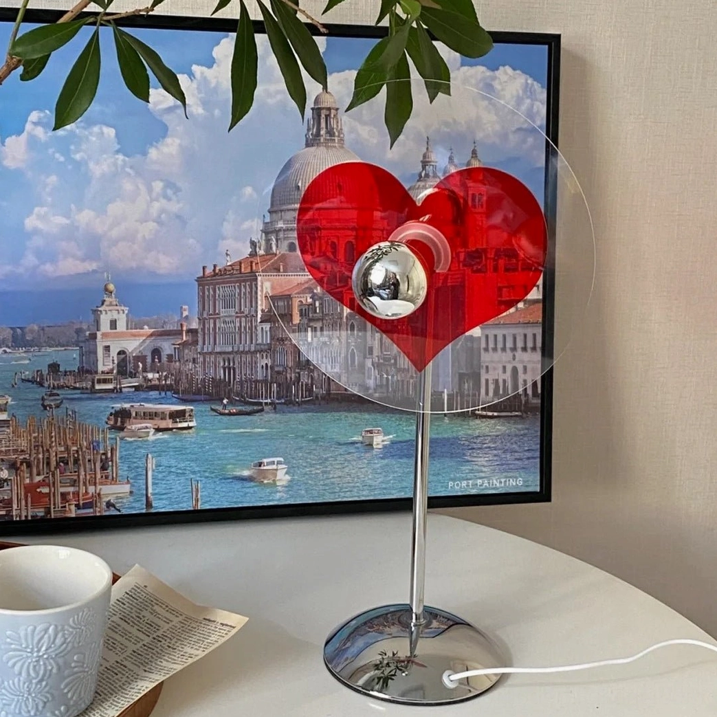 Heart projection lamp positioned in modern interior, showing ambient lighting capability and romantic appeal